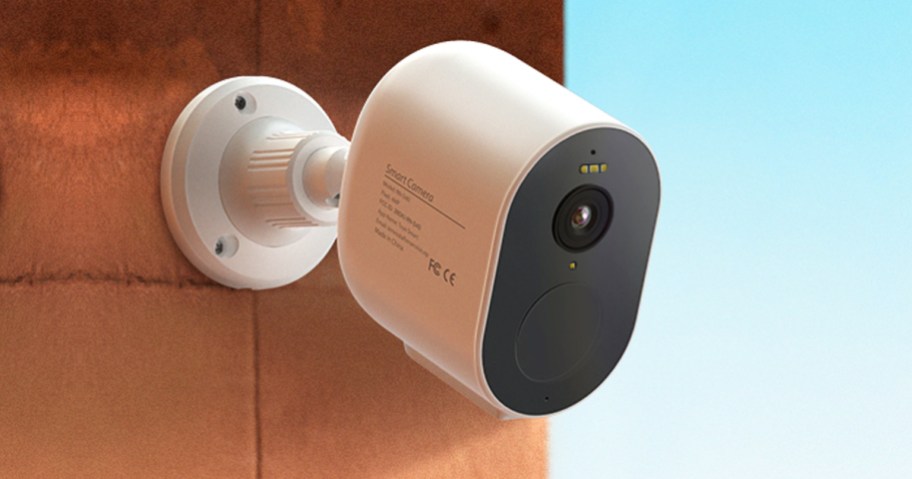 white security camera mounted on wall