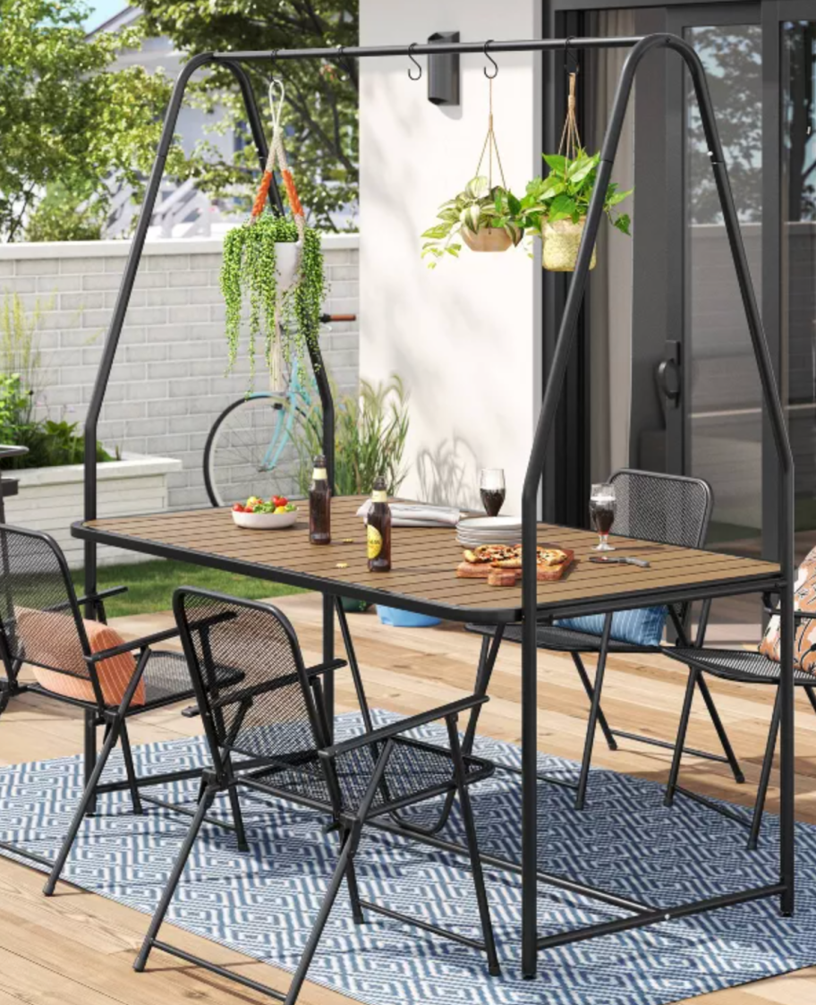 A Target Patio Table with Garden Hooks