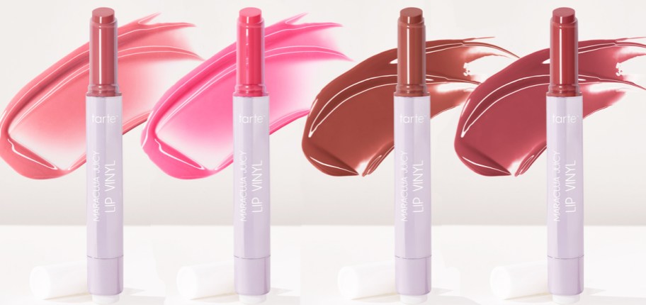 four Tarte Maracuja Juicy Vinyl Lip with swatches behind them