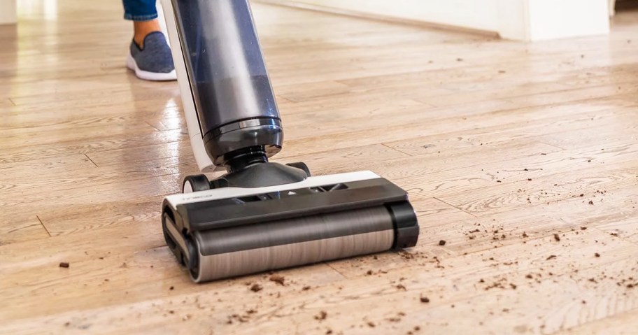 using tineco wet/dry vacuum to clean up dirt on floor