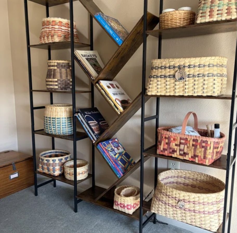 A Tree Bookshelf with baskets on it