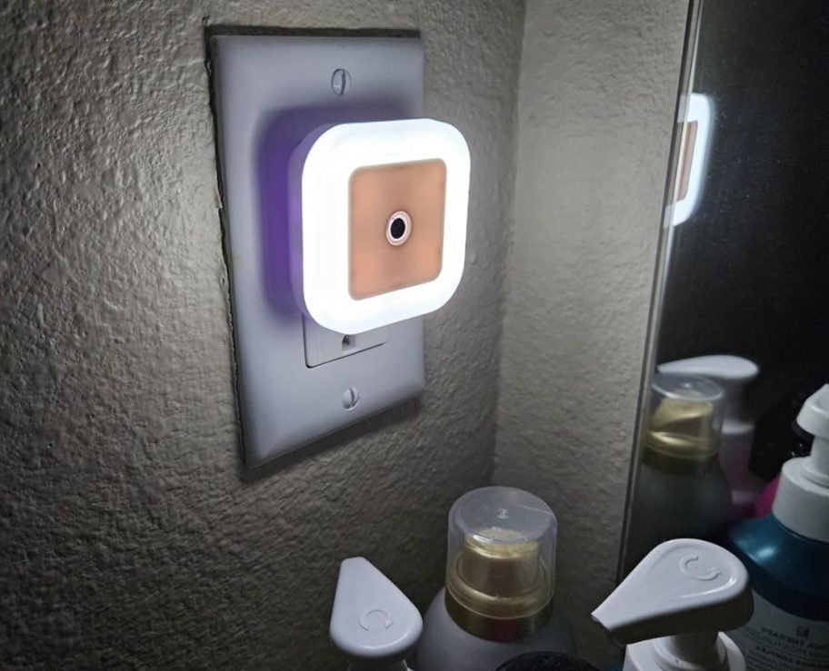 A Uigos Night Light plugged into an Outlet