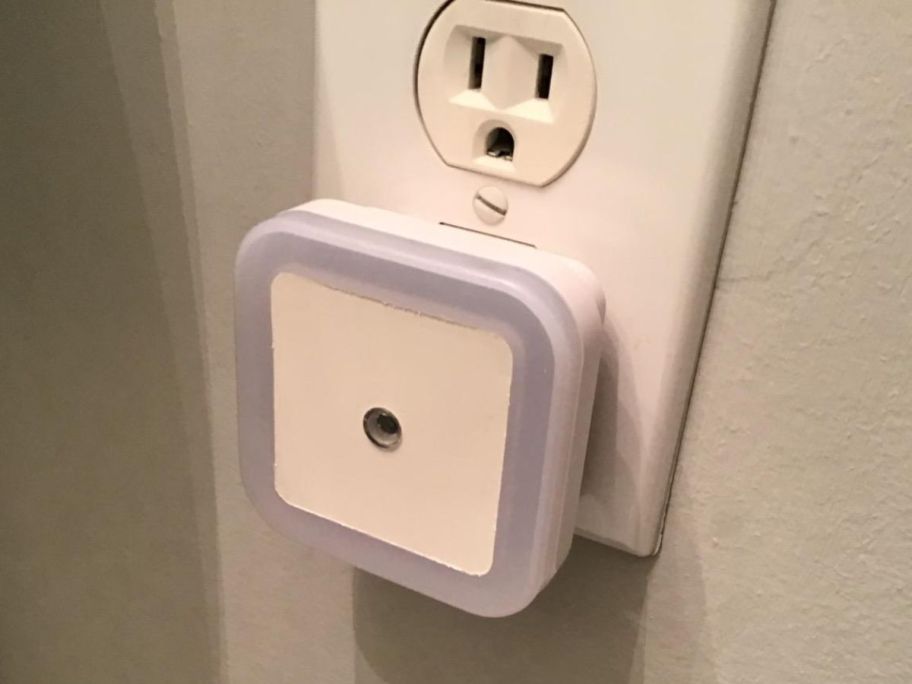 A Uigos Night Light plugged into an outlet