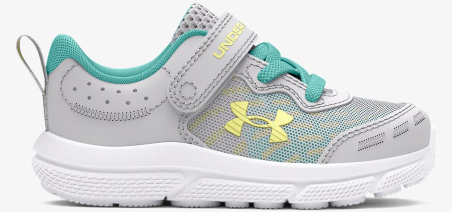 light grey, blue, and yellow under armour running shoe