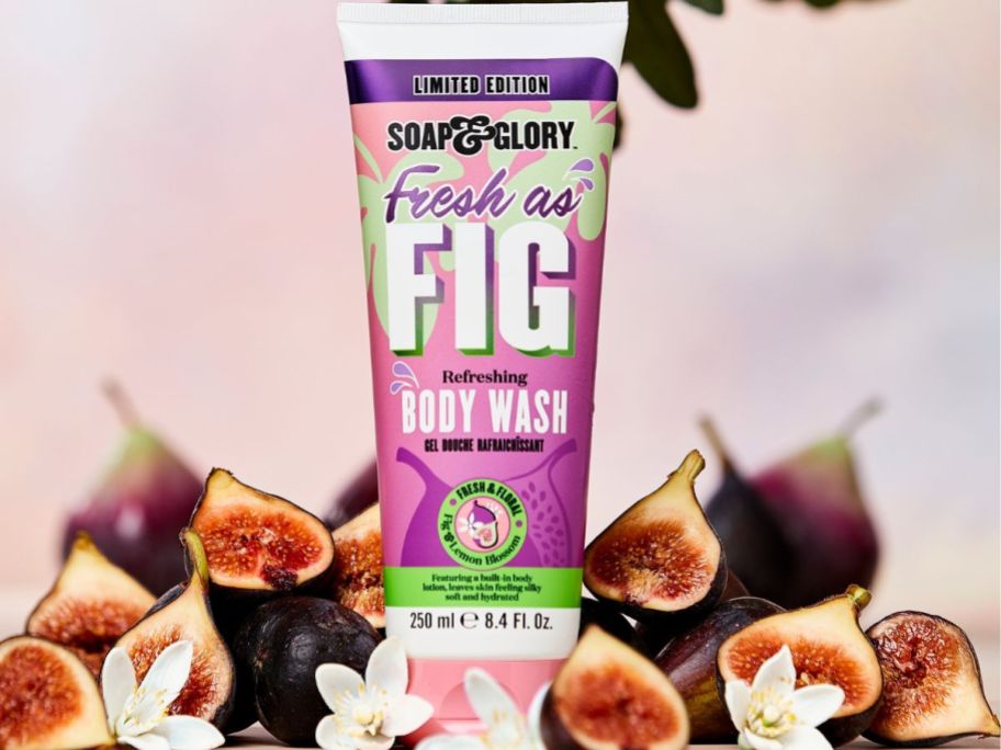 soap & glory fresh as fig body wash with figs and leaves around it