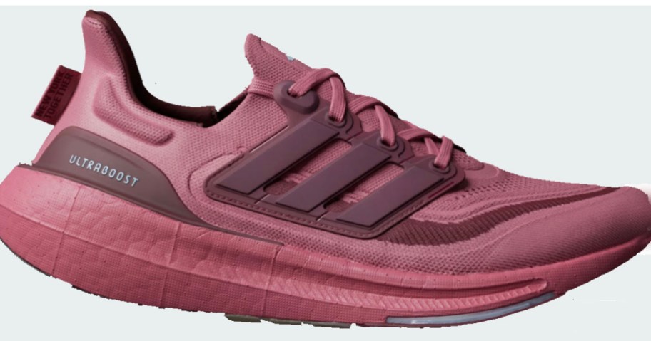 pink and purple adidas ultraboost shoe stock image