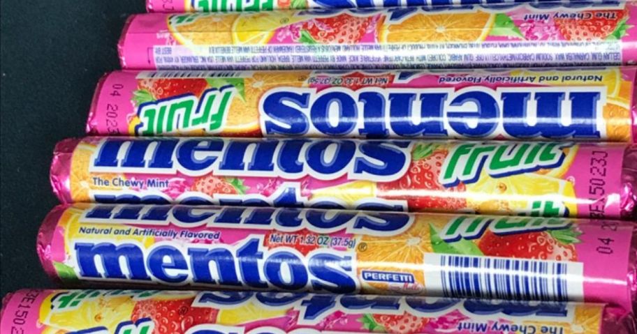 mentos fruit mint rolls laying on a car seat