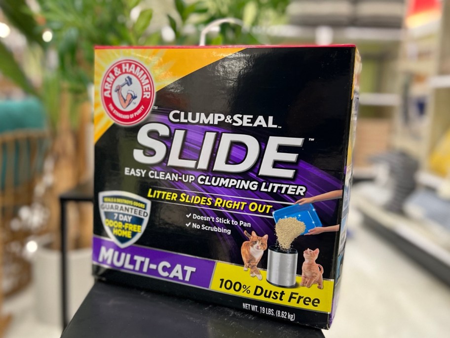 box of Arm & Hammer Slide Platinum Easy Clean-Up Clumping Cat Litter on a stand in store