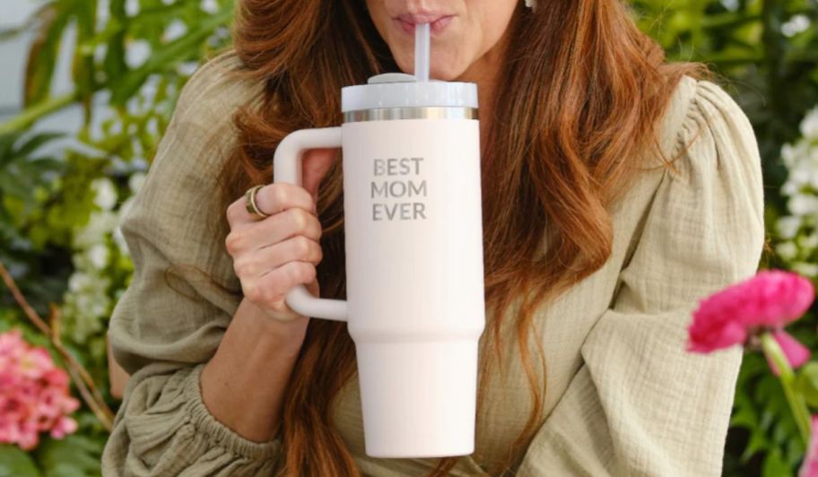 a mom drinking from a customized stanley quencher cup
