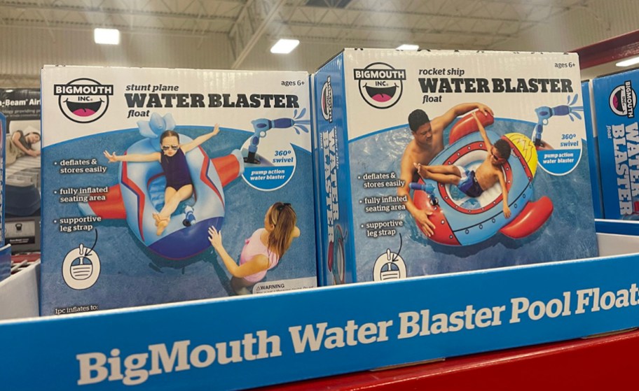 big mouth airplane and rocket ship waterblaster boxes on shelf in store