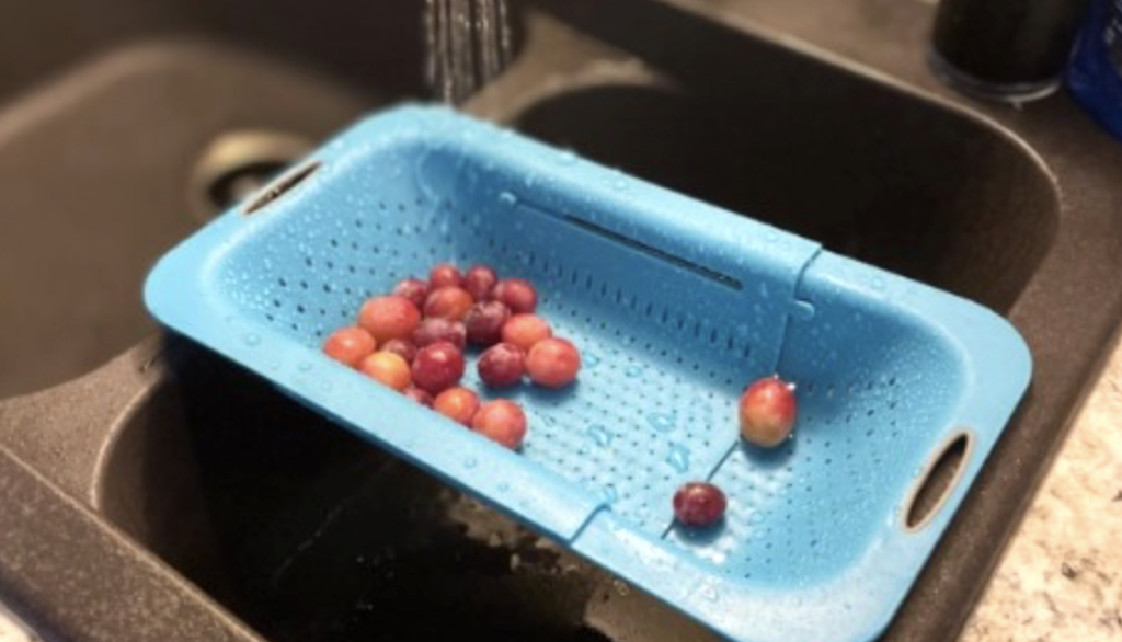blue colander in sink 