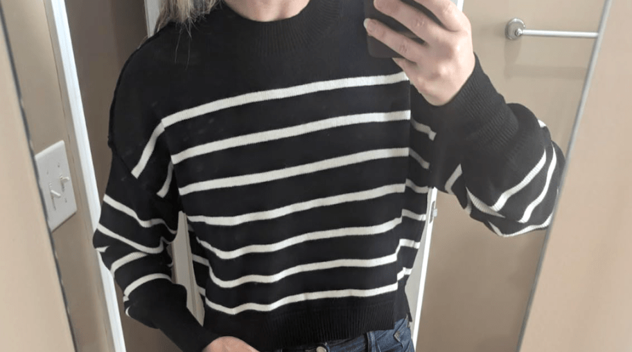 woman wearing cropped striped sweater 