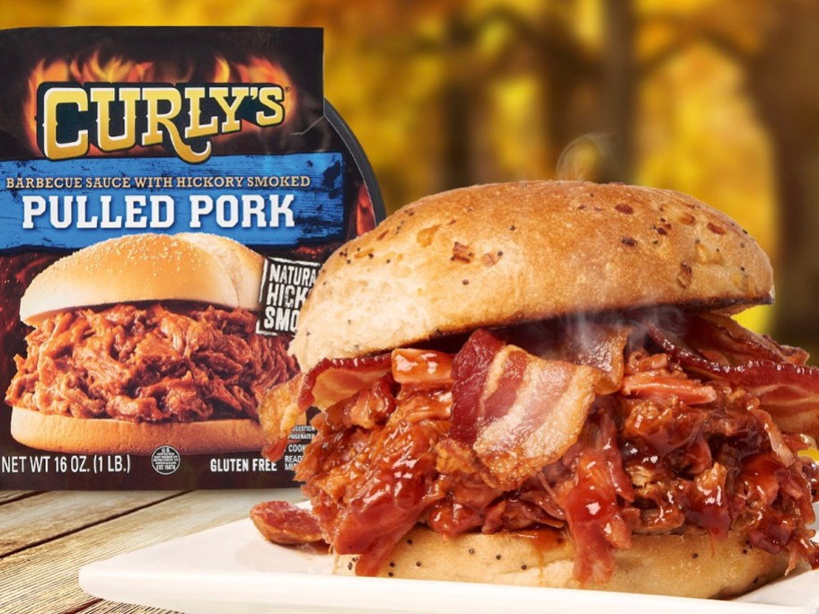 curleys pulled pork box with pulled pork sandwich and bacon