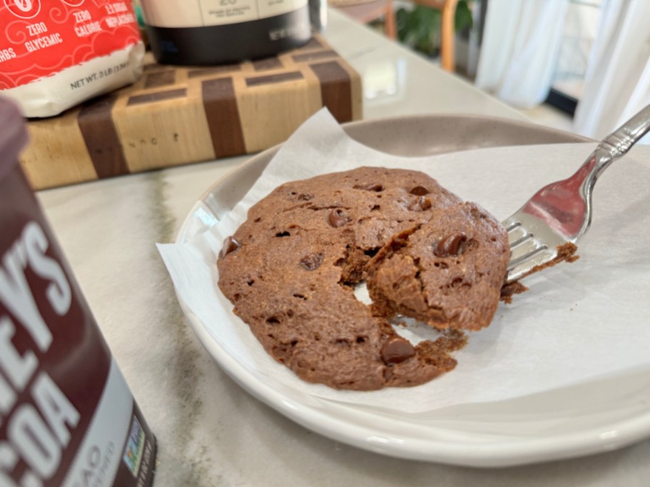 cutting a protein cookie with a fork