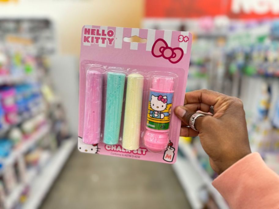 hand holding a Hello Kitty Chalk Set 4-Pack 