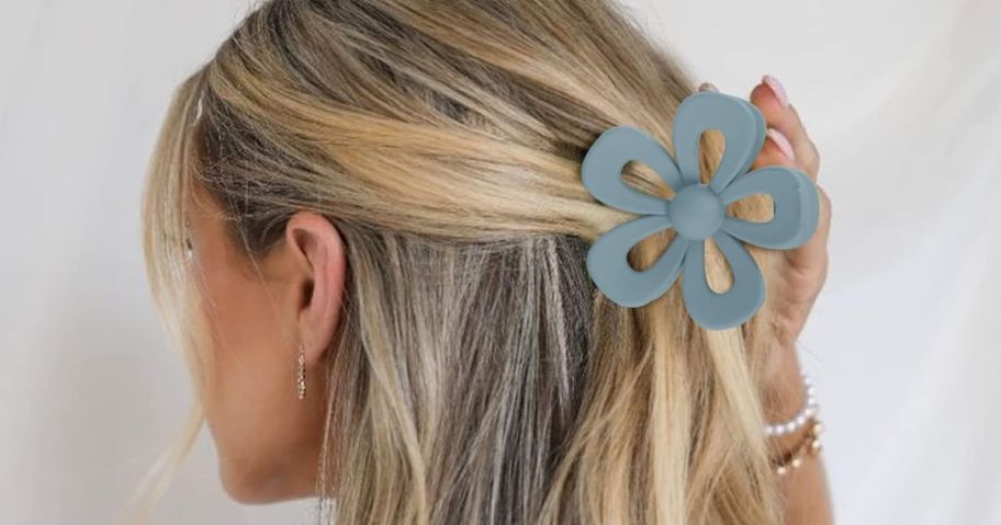 woman wearing flower clip in hair