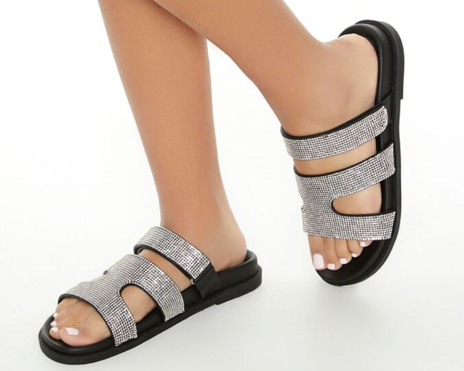 rhinestone cutout sandals on feet