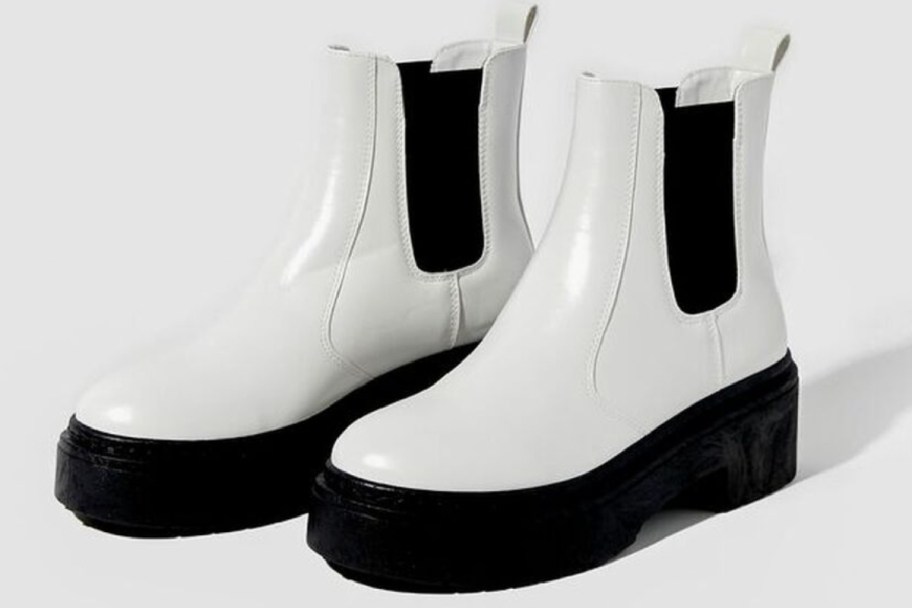 white and black platform boots