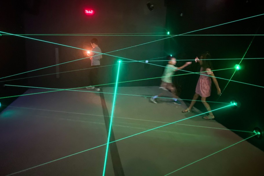 kids playing in a laser maze