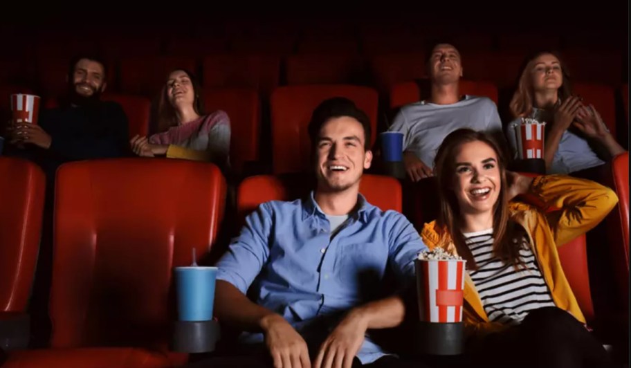couple sitting in movie theater