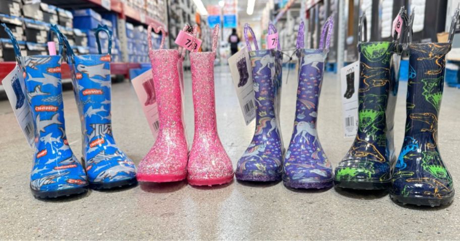4 pair of kids light up rain boots in 4 designs