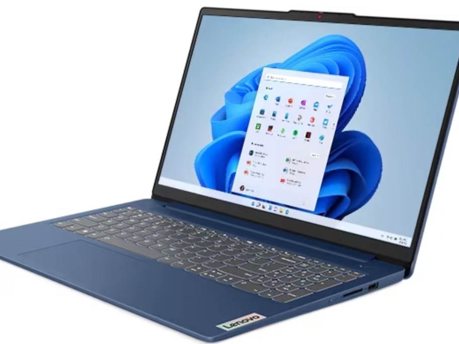 blue Lenovo laptop open showing start screen