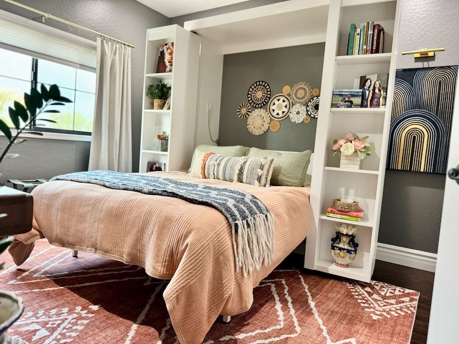 murphy bed in guest room with boho decor