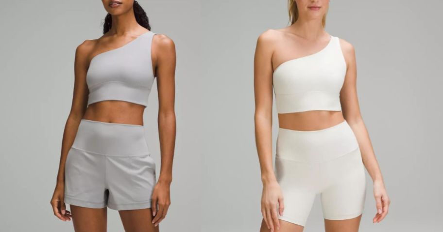 woman wearing gray and white Asymmetrical bras