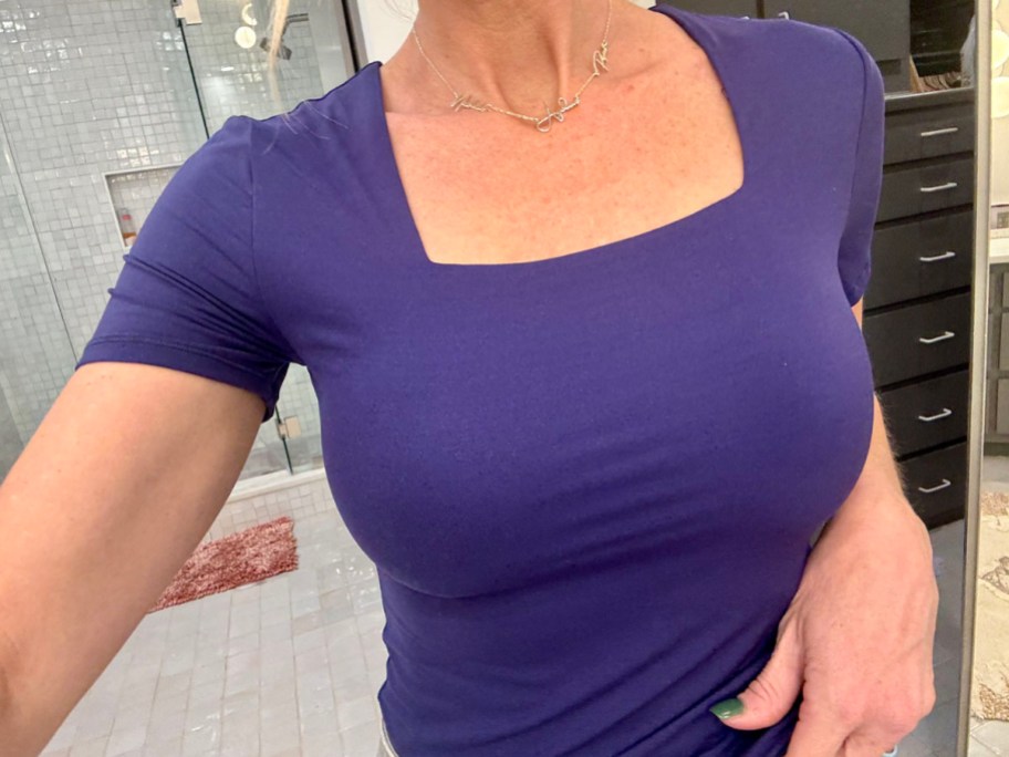 woman wearing purple square neck t shirt