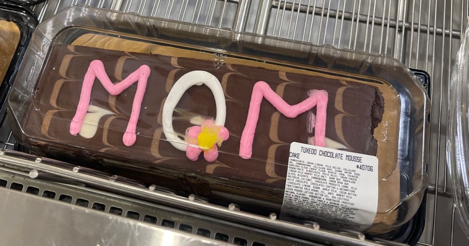 chocolate cake with mom wrote on top in pink 