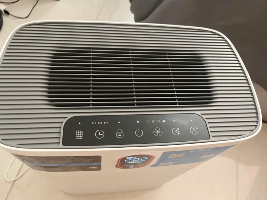 gray morento air purifier top sitting on floor