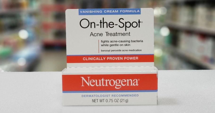 a box of neutrgena on the spot acne treatment