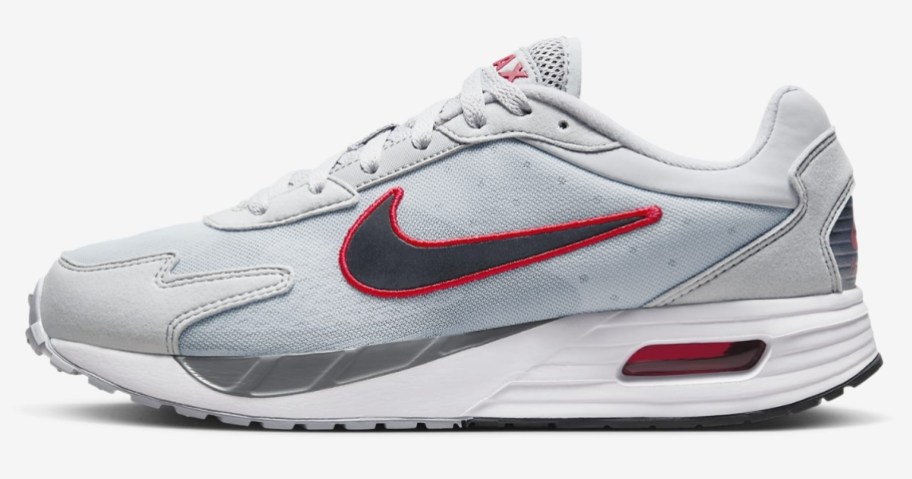 blue, white, red and grey men's Nike shoe