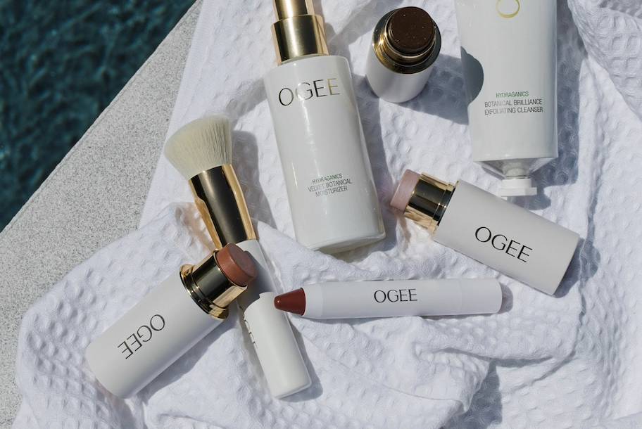 various ogee makeup products on white towel
