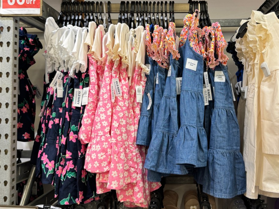 cami t-shirt dresses in store hanging on rack