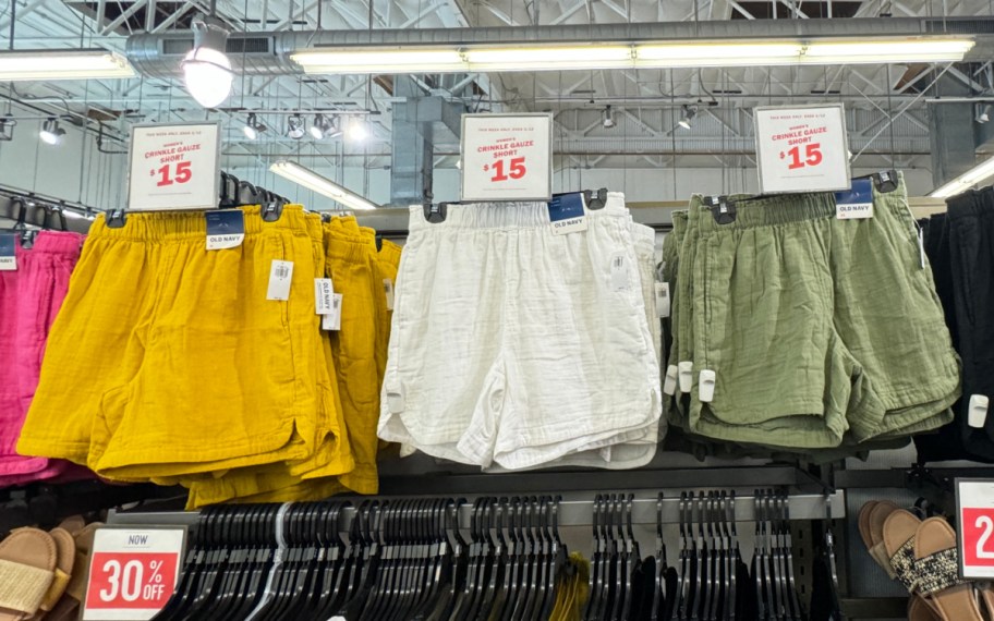 white green and yellow gauze shorts hanging in store