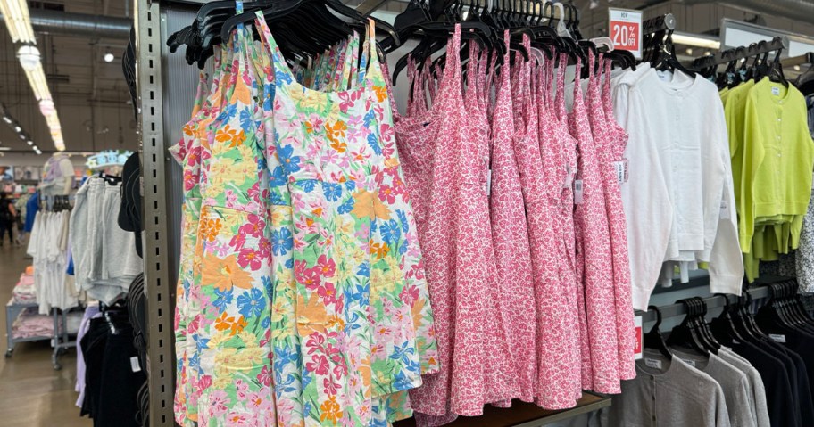 floral and pink womens mini dresses hanging in old navy store