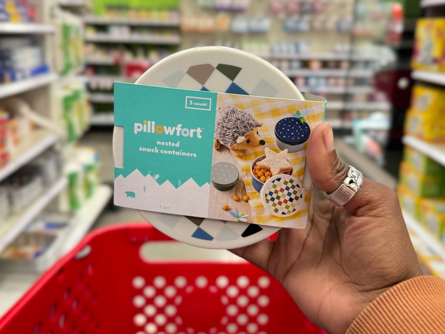 hand holding pillowfort container in target store