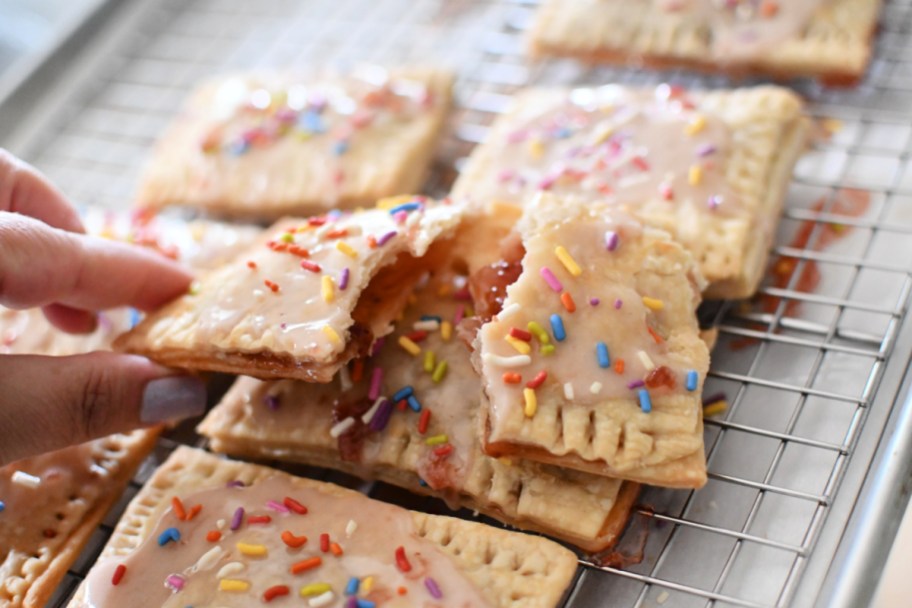pop tarts on a sheet pan with one cut in half