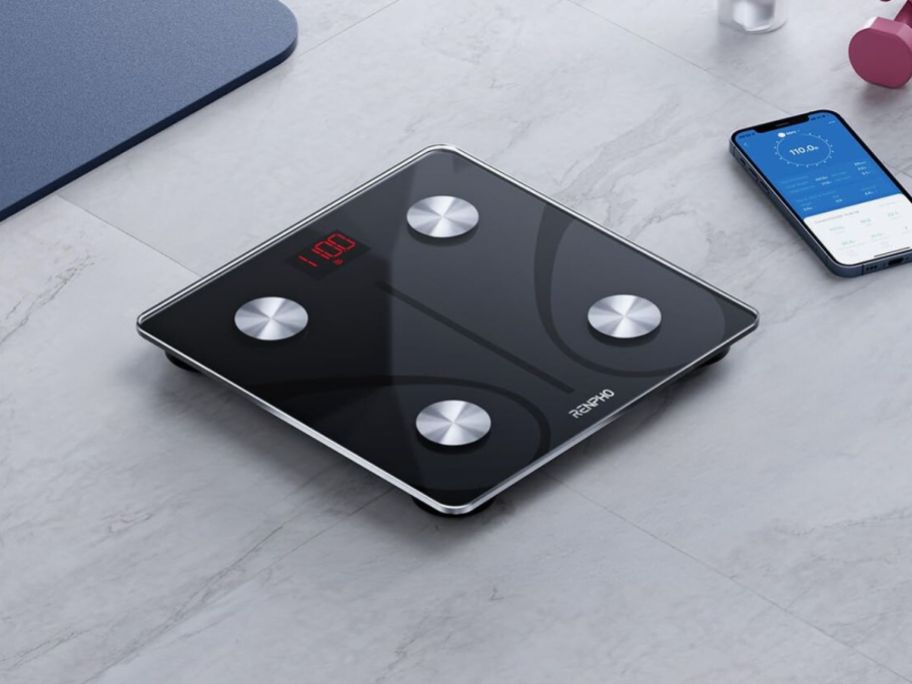 digital scale on counter with phone