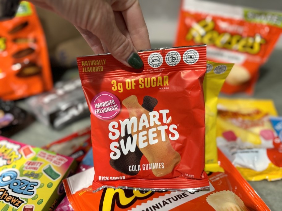 hand holding up bag of smartsweets