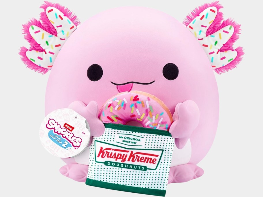 Snackles Axolotl plush with a plush Krispy Kreme donut