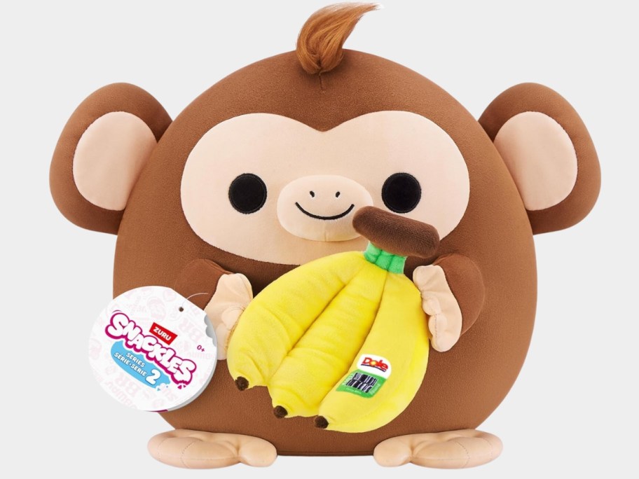 Snackles plush Monkey with a bunch of plush Dole Bananas
