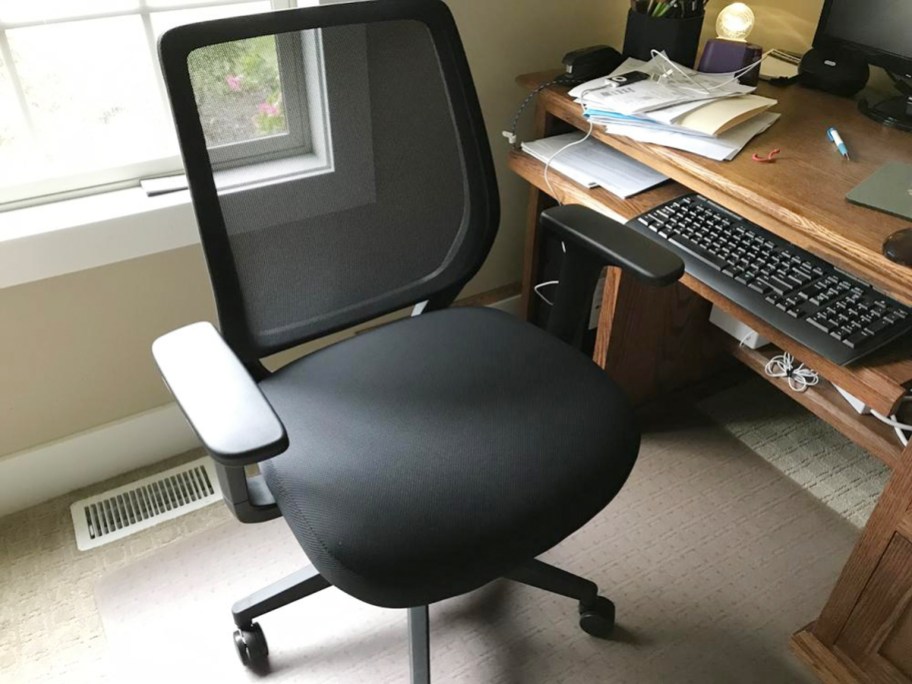 black office chair with mesh back in office