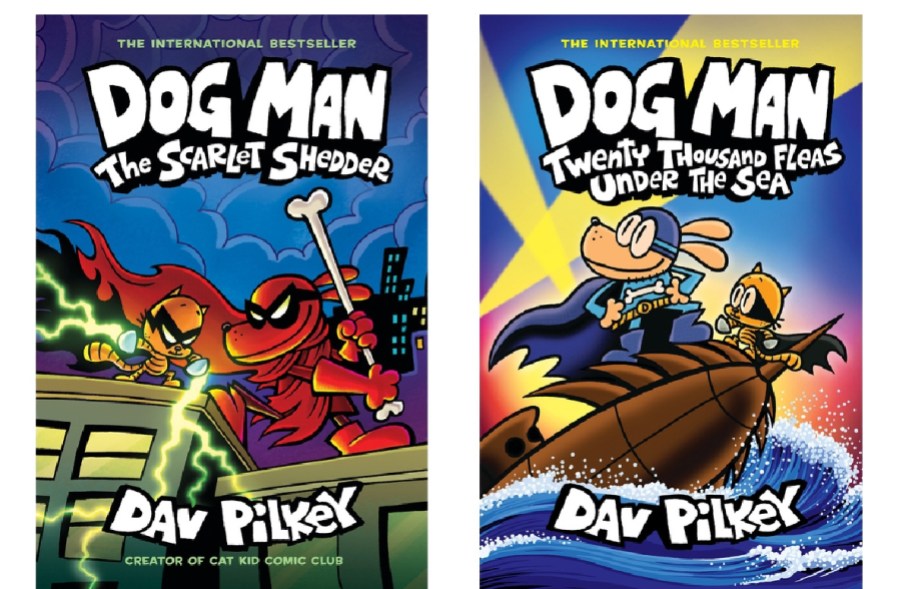 stock image of two dog man books