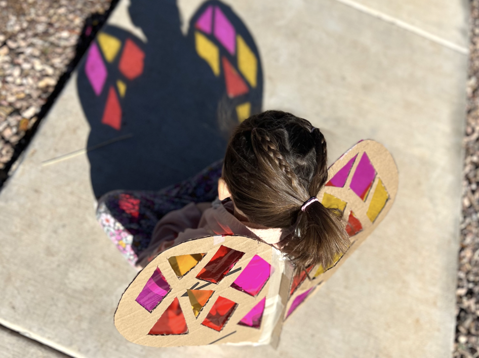 girl with sun catcher butterfly 