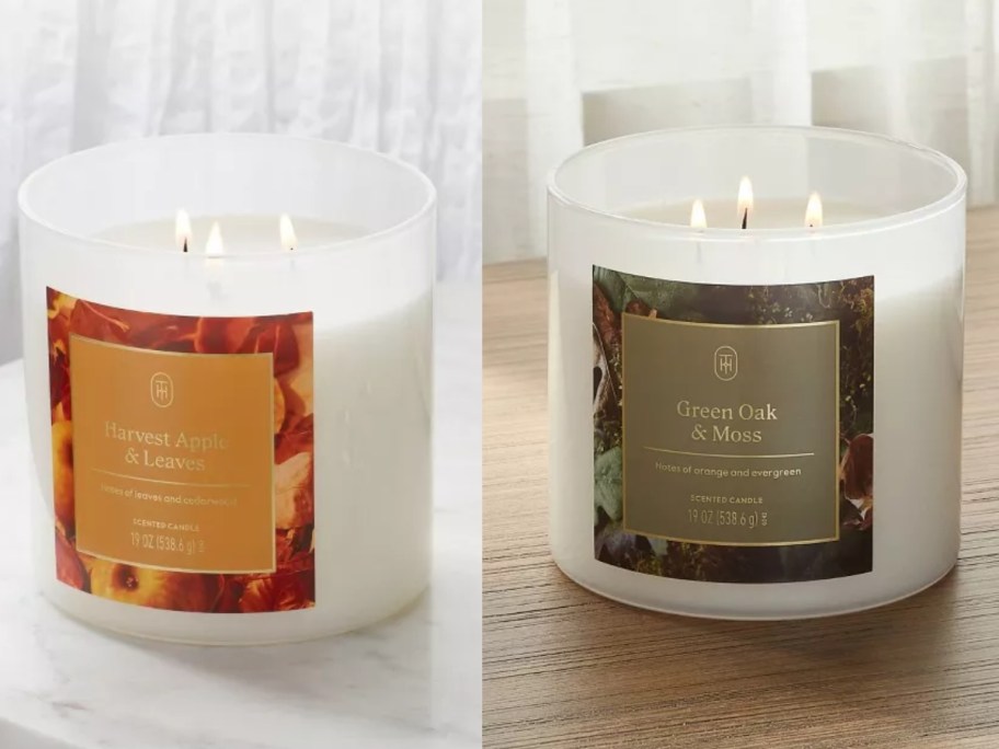 side by side image of 2 large 3-wick class candles with Fall scents and colored labels