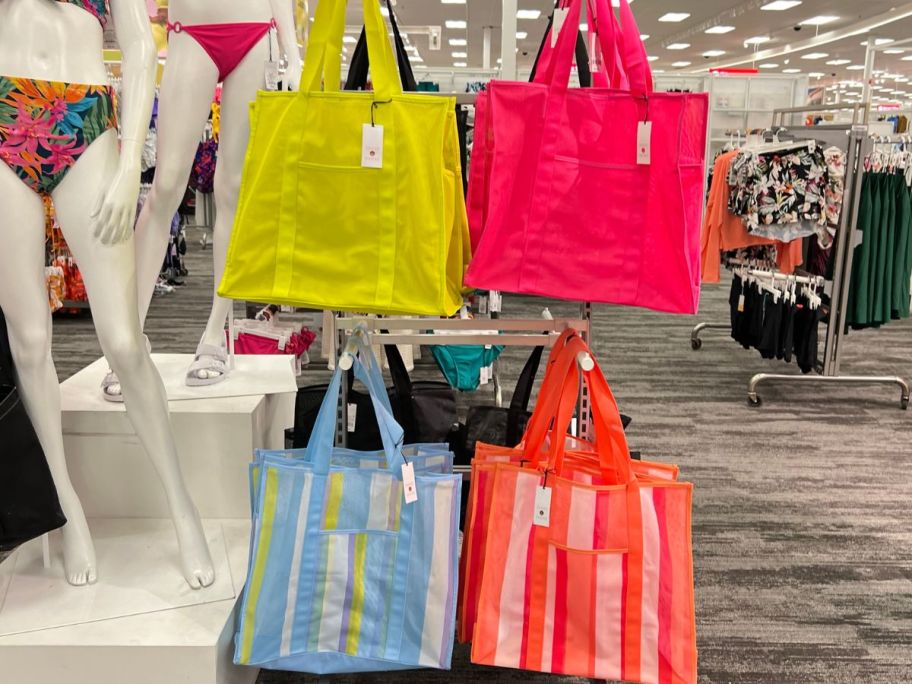 Mesh Tote Handbags - Shade & Shore hanging on rack in store