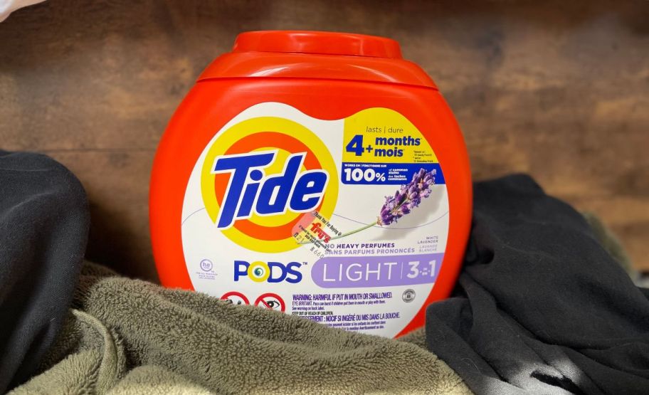 tide light pods on laundry pile