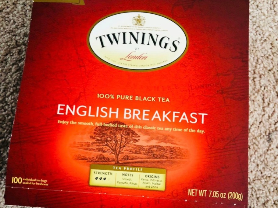 twinnings english breakfast tea box laying on carpet